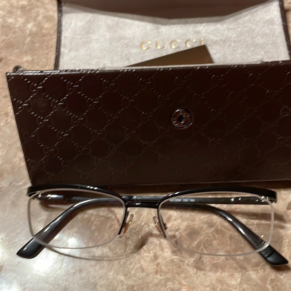 Gucci Oval Style Black Frame